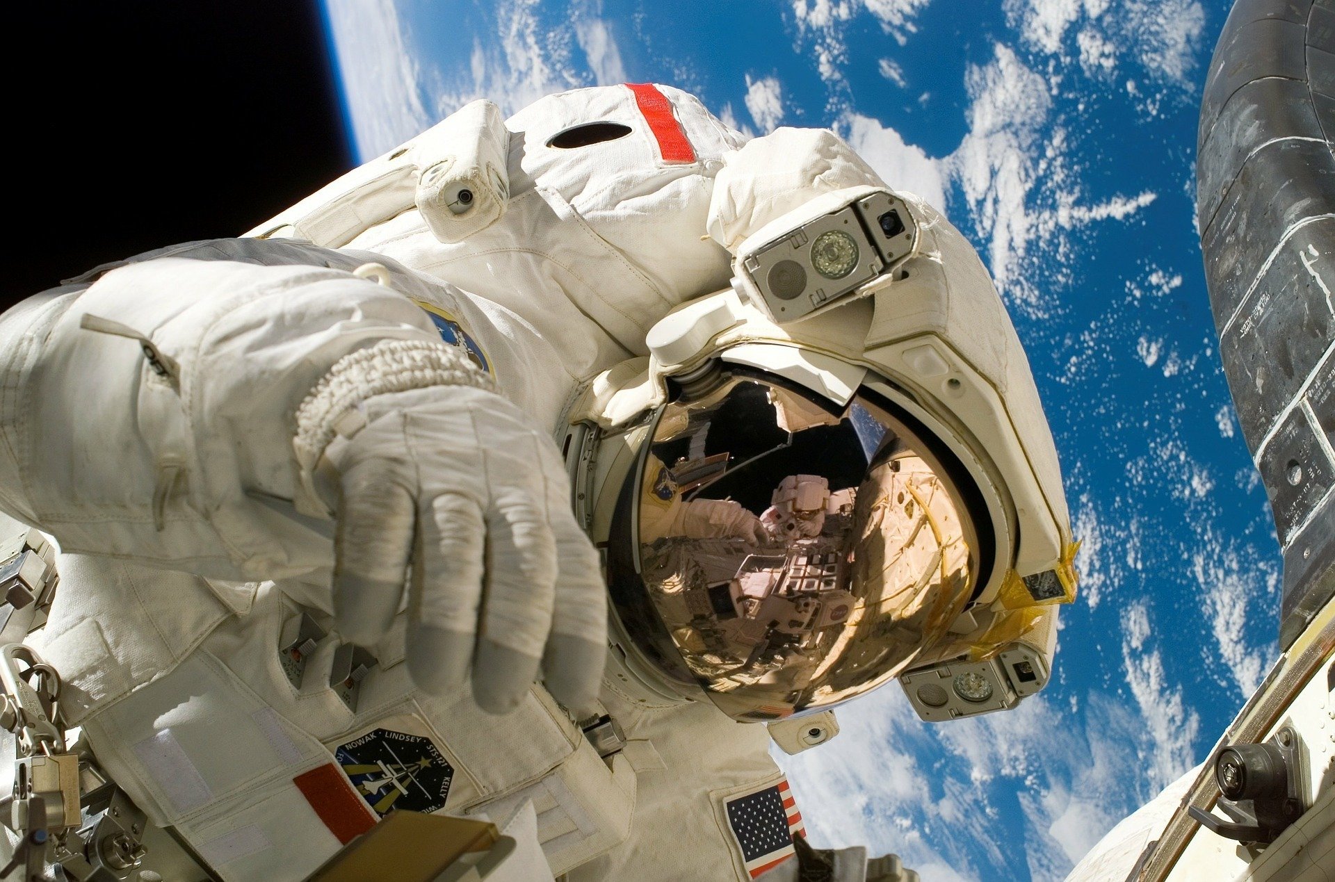 astronaut spacesuit outer space iss instruments suit flight international space station maintenance spacewalk helmet visor reflection space space