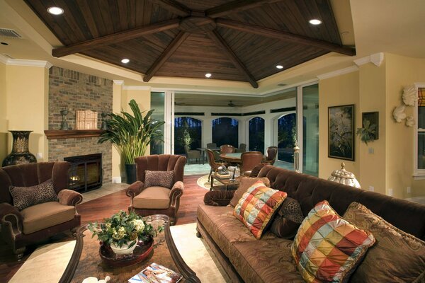 Living room with large pillows and flowers