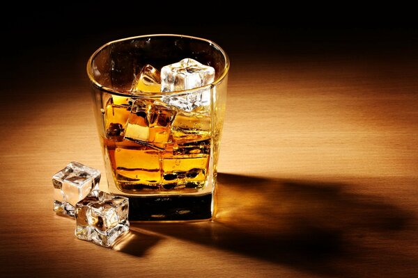 Whiskey with ice in a beautiful glass