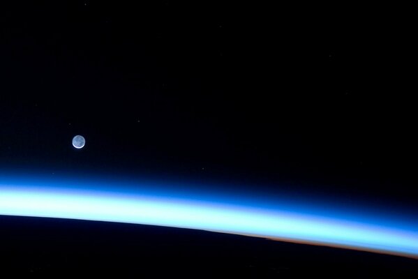 A small planet above a beautiful blue light