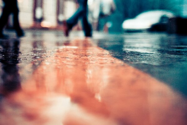 Rain and puddles on the roads streets