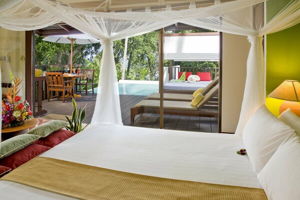 Cozy bedroom with access to the pool