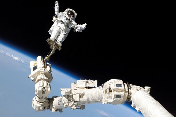 An astronaut in free fall in orbit