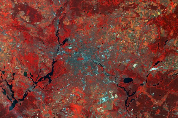 The earth from outer space is abstract in red tones