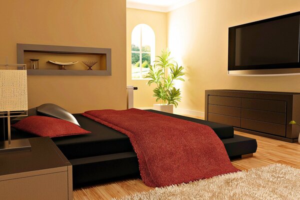 Large bed and carpet in the bedroom interior