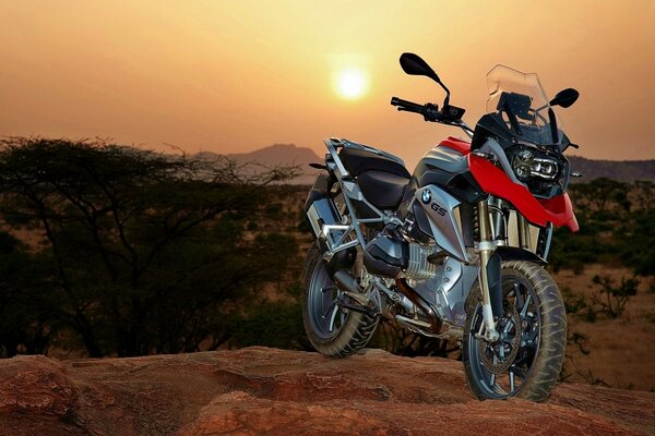 On the background of sunset - a powerful sports motorcycle