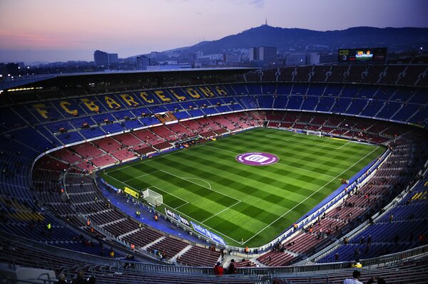 Playing football in the evening at the stadium