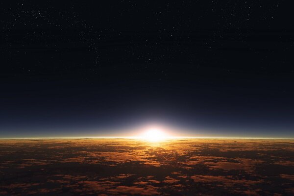 Amanecer sobre la superficie del planeta al borde de la fusión con el cielo