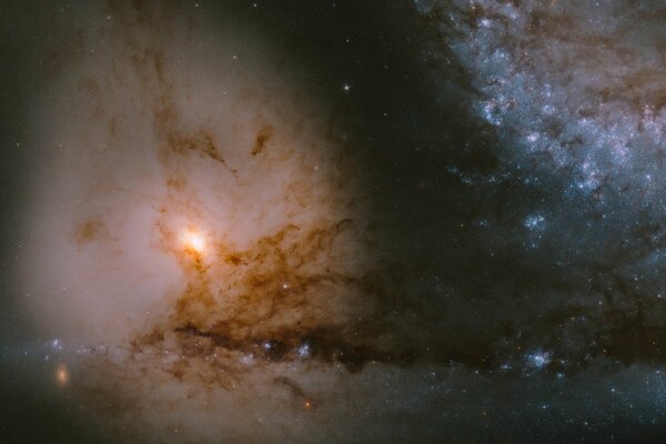 In space, a stellar galaxy stretches for a huge distance