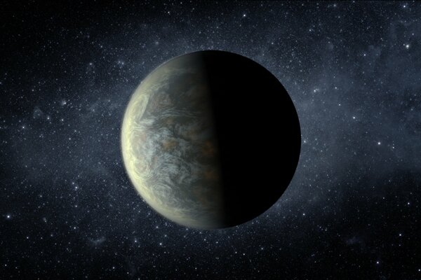 An exoplanet in outer space on which sunlight falls from one side