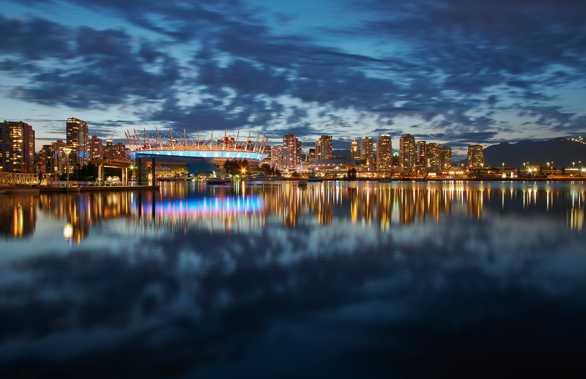 vancouver canada british columbia town night blue sky clouds house lighting skyscraper buildings stadium light gulf reflection