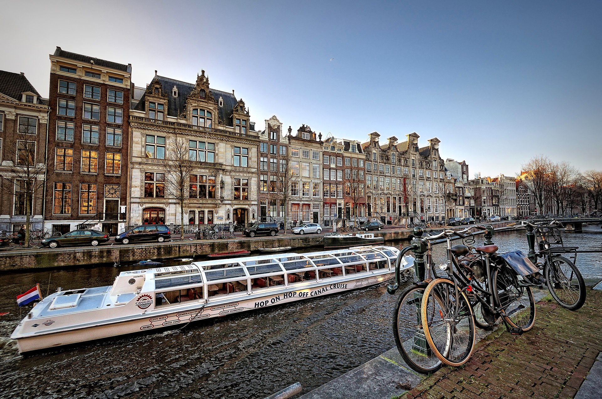 amsterdam netherlands houses canal boat ship bicycle