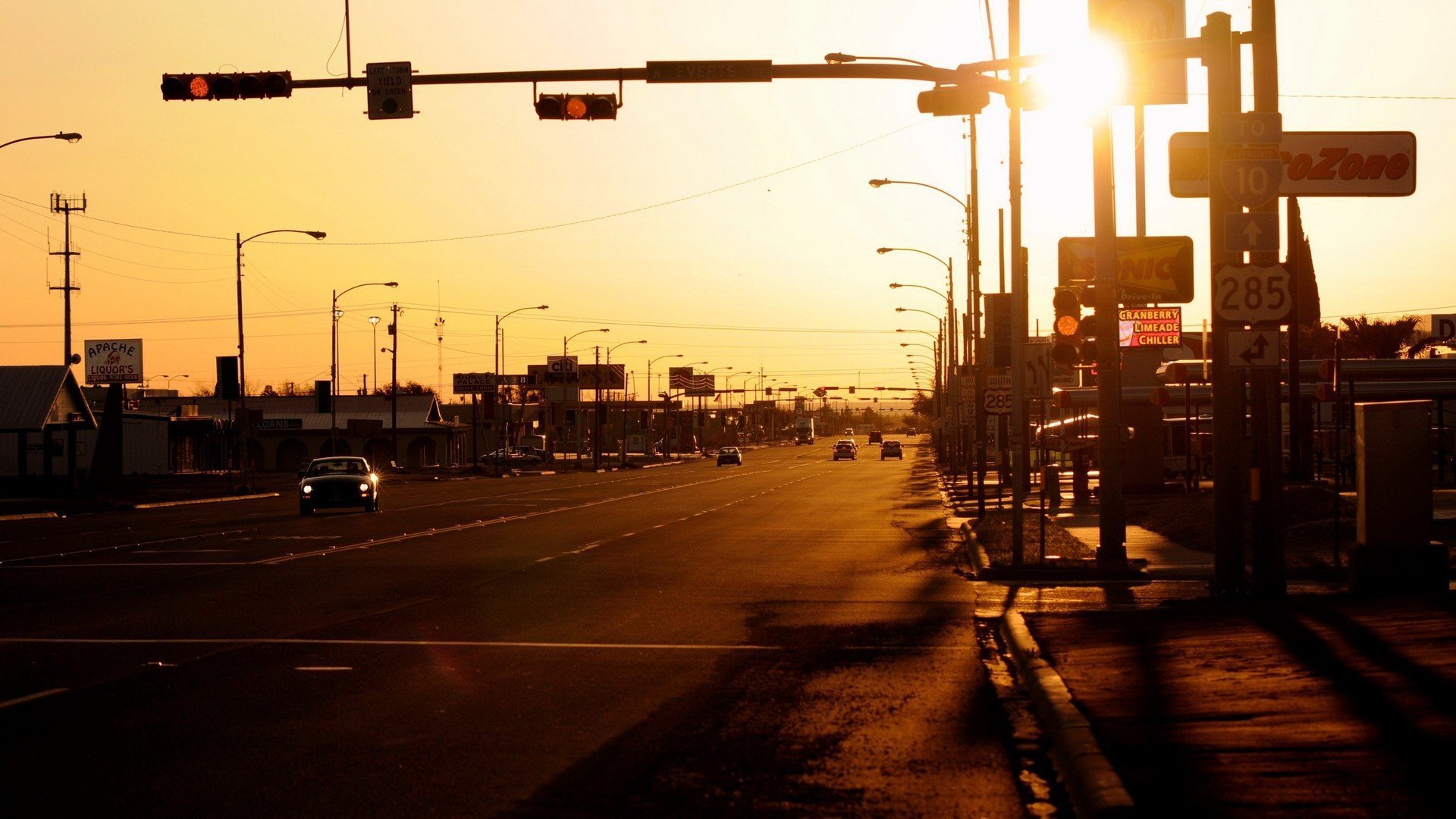 town street cars lamps sun