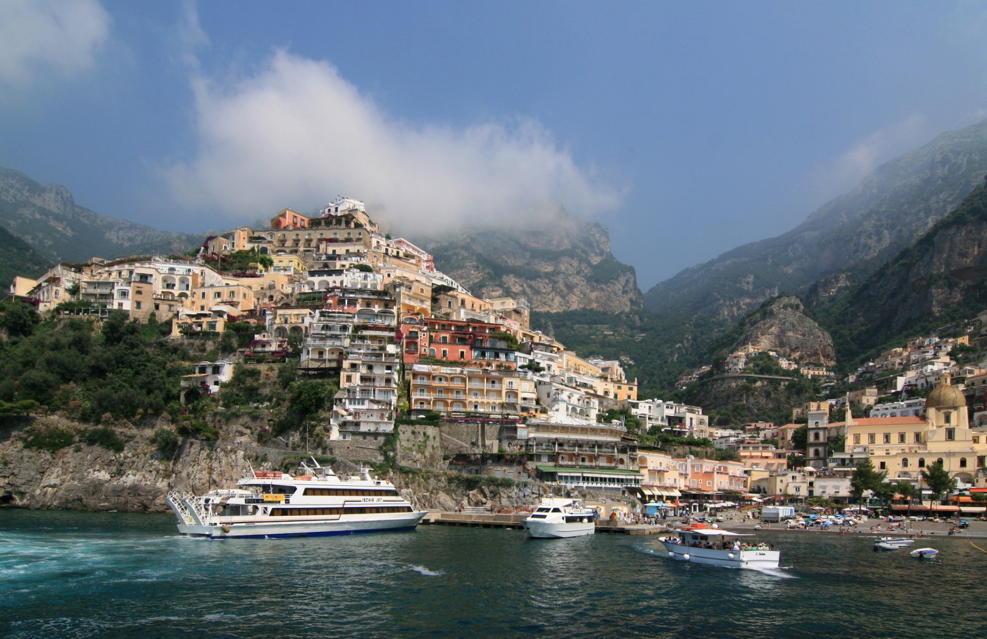 italy coast mountain yacht positano town sky clouds photo