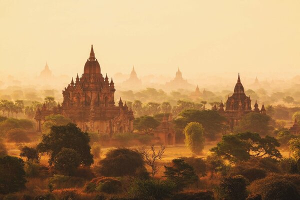 Towering temples on a foggy morning