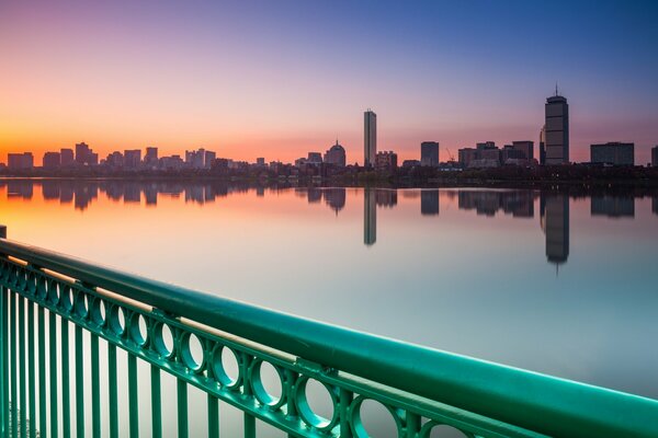 View from the embankment to the city across the ocean