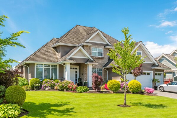 Beautiful country house near a green lawn