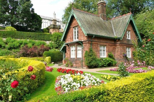 A house in a blooming garden. Architecture