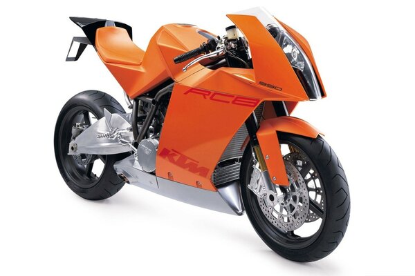 Orange KTM motorcycle on a white background