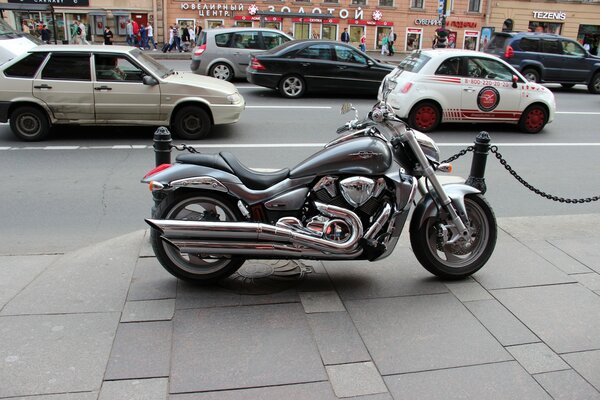 Harley Davidson on a sidewalk in the city