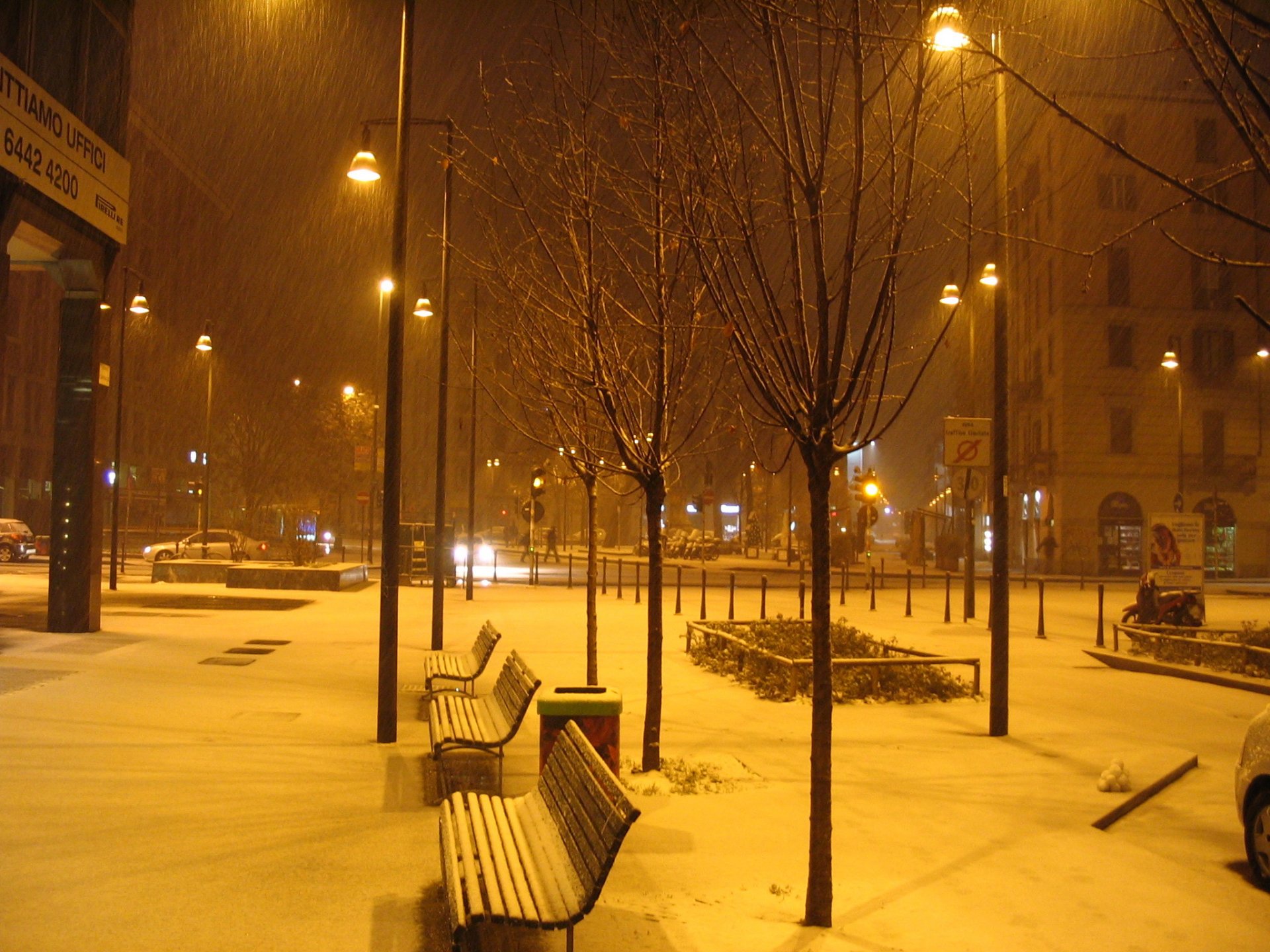 italy milan night bench lamps snow town photo