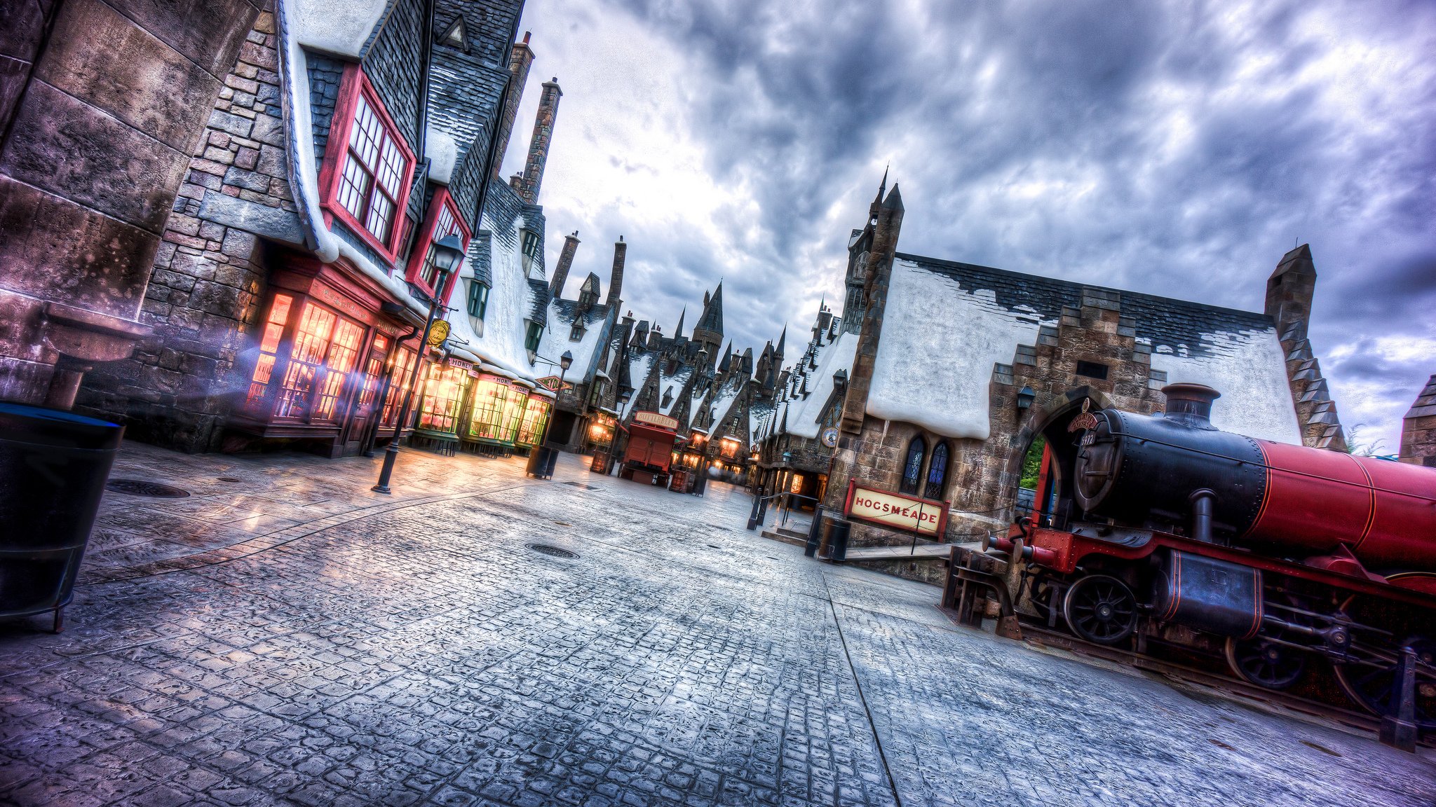 universal studios florida mundo mágico de harry potter ciudad calle casas nieve invierno