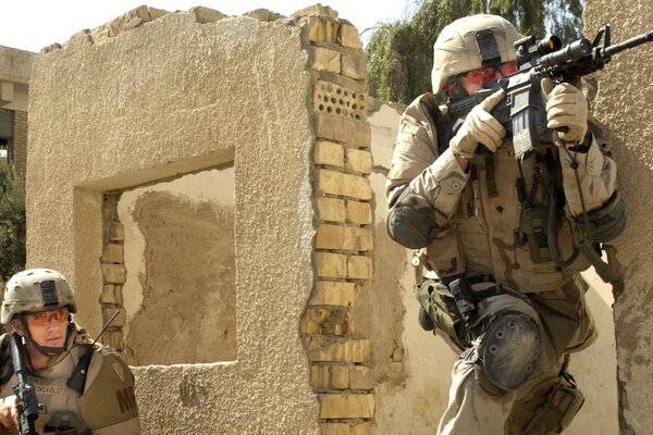 Soldiers in the American army with weapons on exercises