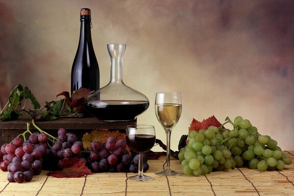 Still life with wine and different grape varieties