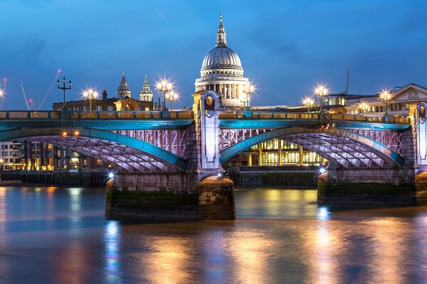 St. Paul s Cathedral in London. View of Blackfriars Bridge and St. Paul s Cathedral in London at night. Beautiful landscape, bright lights of London streets