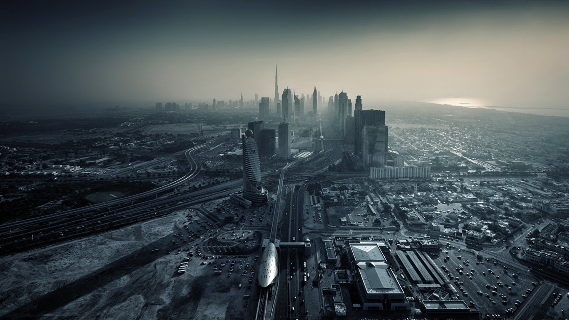 dubai ciudad puesta de sol emiratos árabes unidos emiratos metrópolis rascacielos edificios carreteras