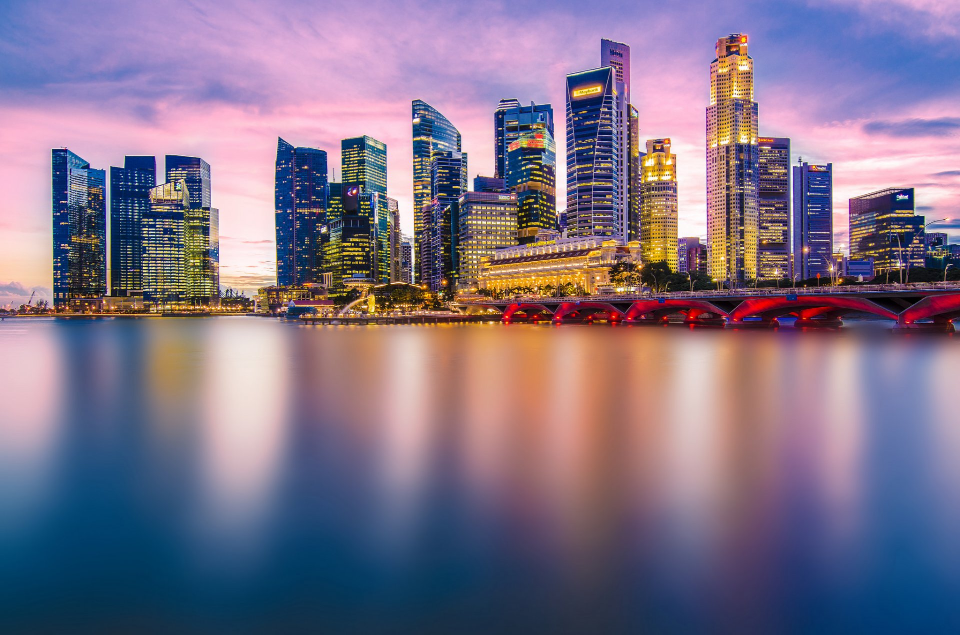 singapur asien stadt abend lichter hintergrundbeleuchtung wolkenkratzer häuser brücke bucht