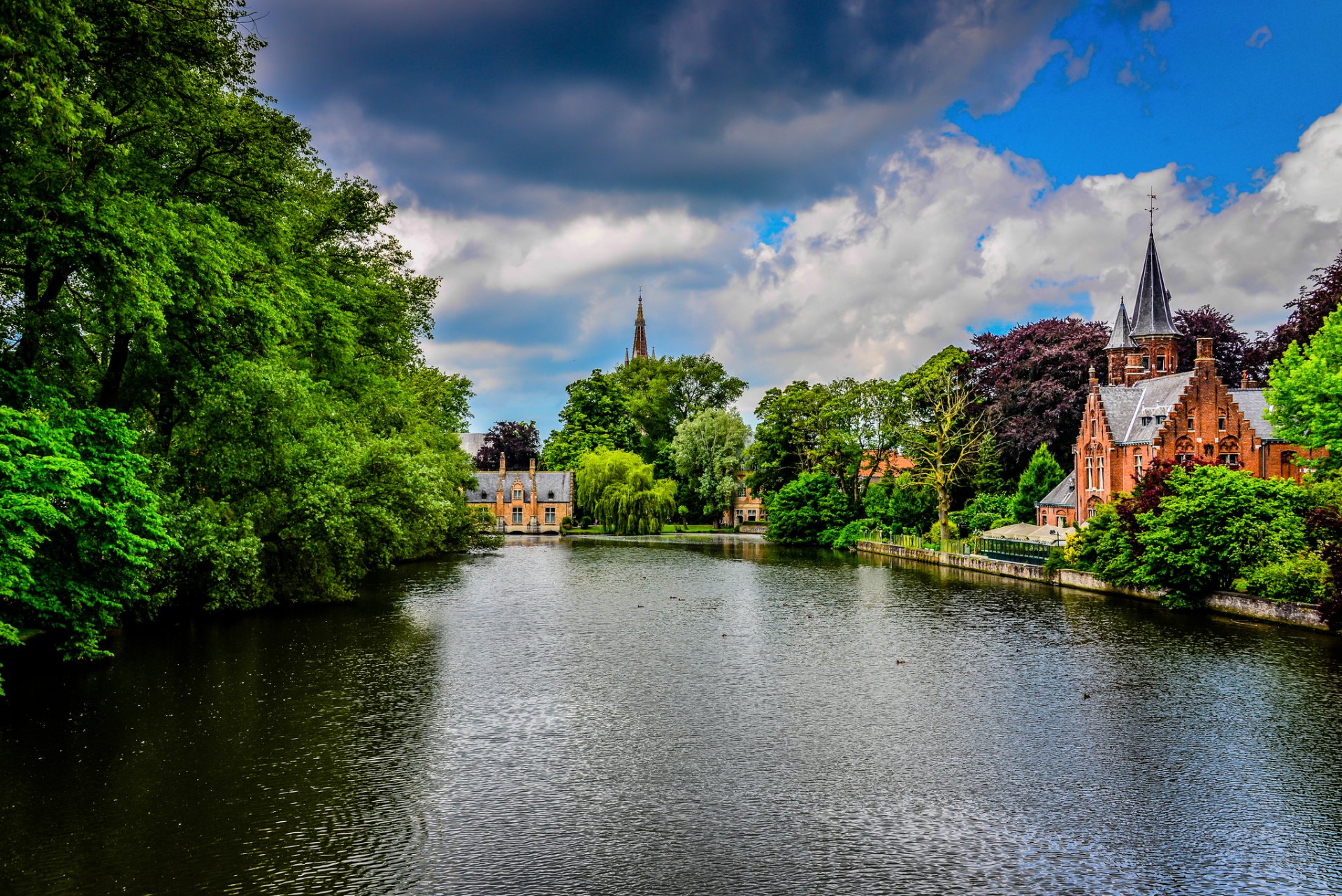 bruges belgium kasteel beauvigne minnewater park city park river canal castle buildings architecture trees nature greenery sky cloud