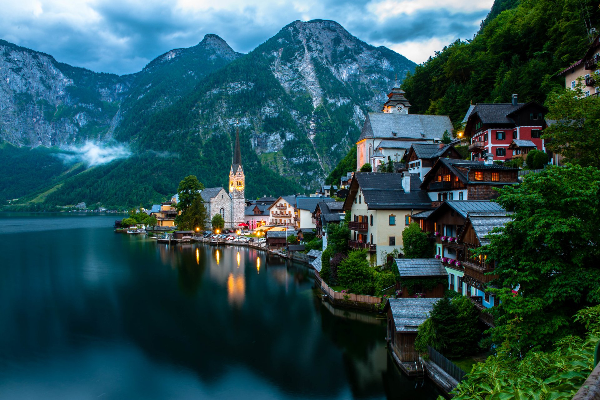 hallstatt salzkammergut österreich austria dachstein mountains alps city evening lake boats houses buildings church nature trees landscape