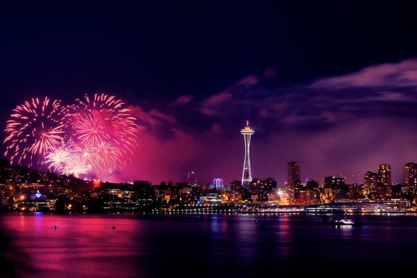 Fireworks on July 4th in Seattle. Panoramic view of the city