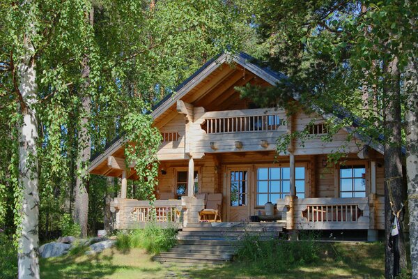 Wooden house in nature next to the river