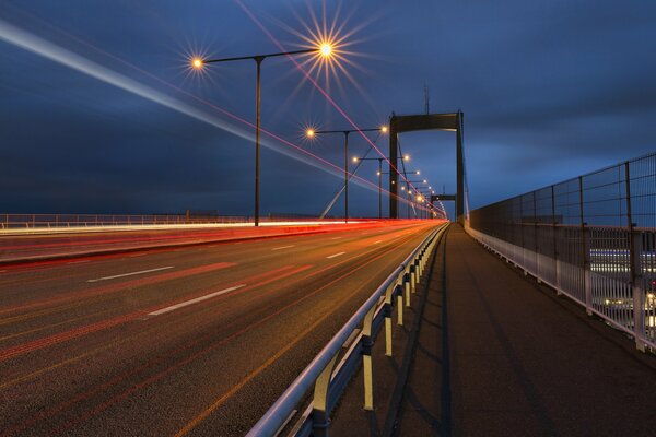 City lights at night against the blue sky