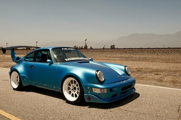 Sky blue classic porsche 911 turbo