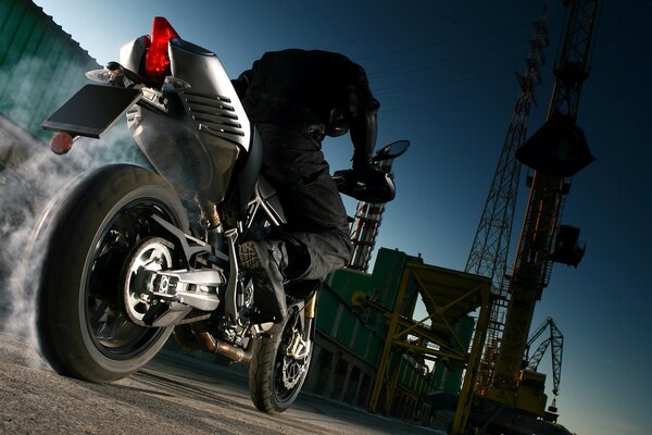 A sports motorcycle rides at the factory