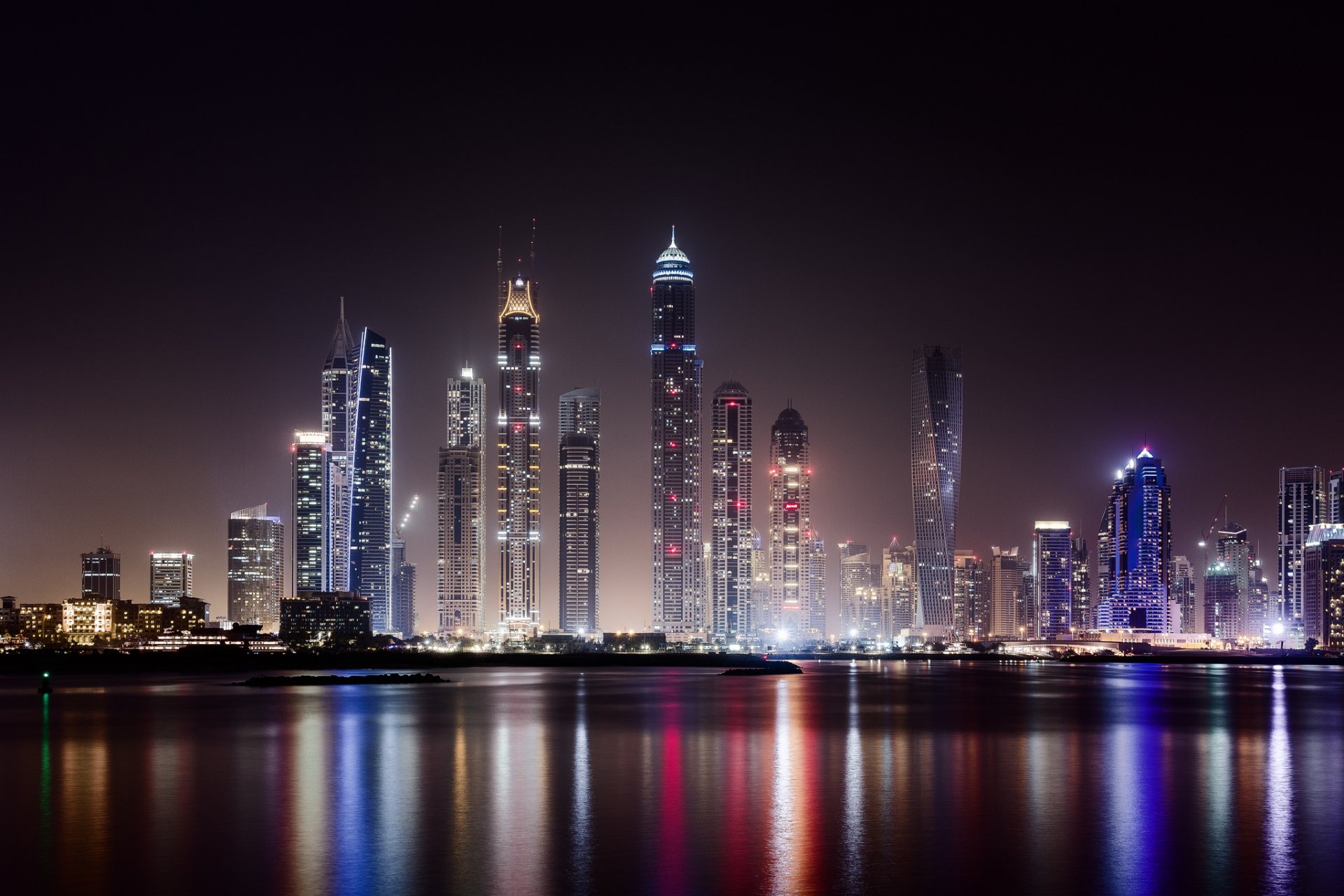 emirati arabi uniti emirati arabi uniti dubai città metropoli grattacieli case edifici notte illuminazione luci acqua luce