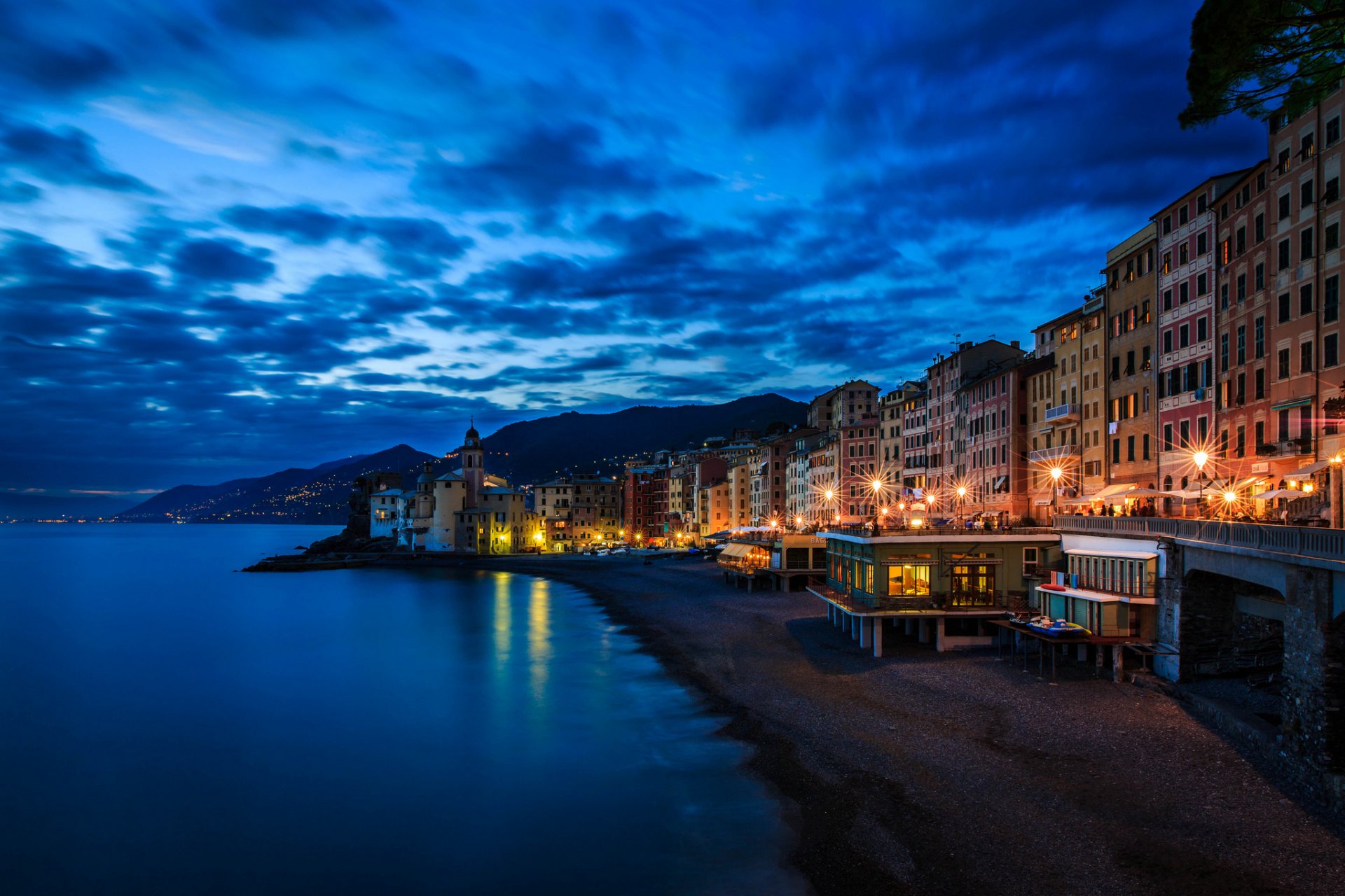 camogli town italy liguria region provincia di genova genova province night sky clouds ligurian sea coast sand beach house buildings light nature landscape