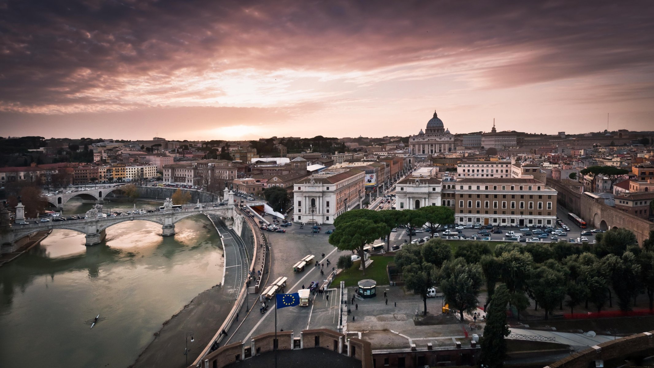 town italy vatican city street road buildings house water bridge people tree sky