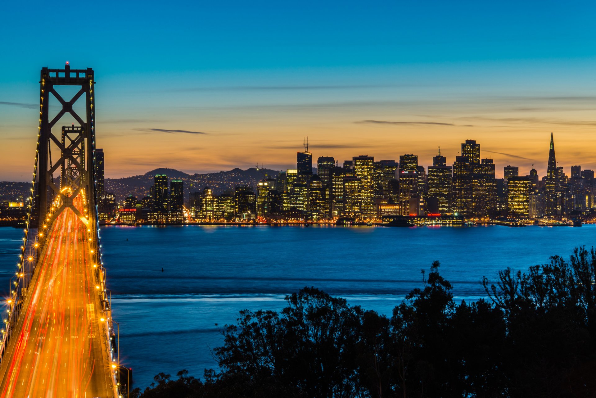 bay bridge oakland san francisco california usa united states town suspension bridge night road lights extract light lighting gulf water tree house skyscraper high-rise building