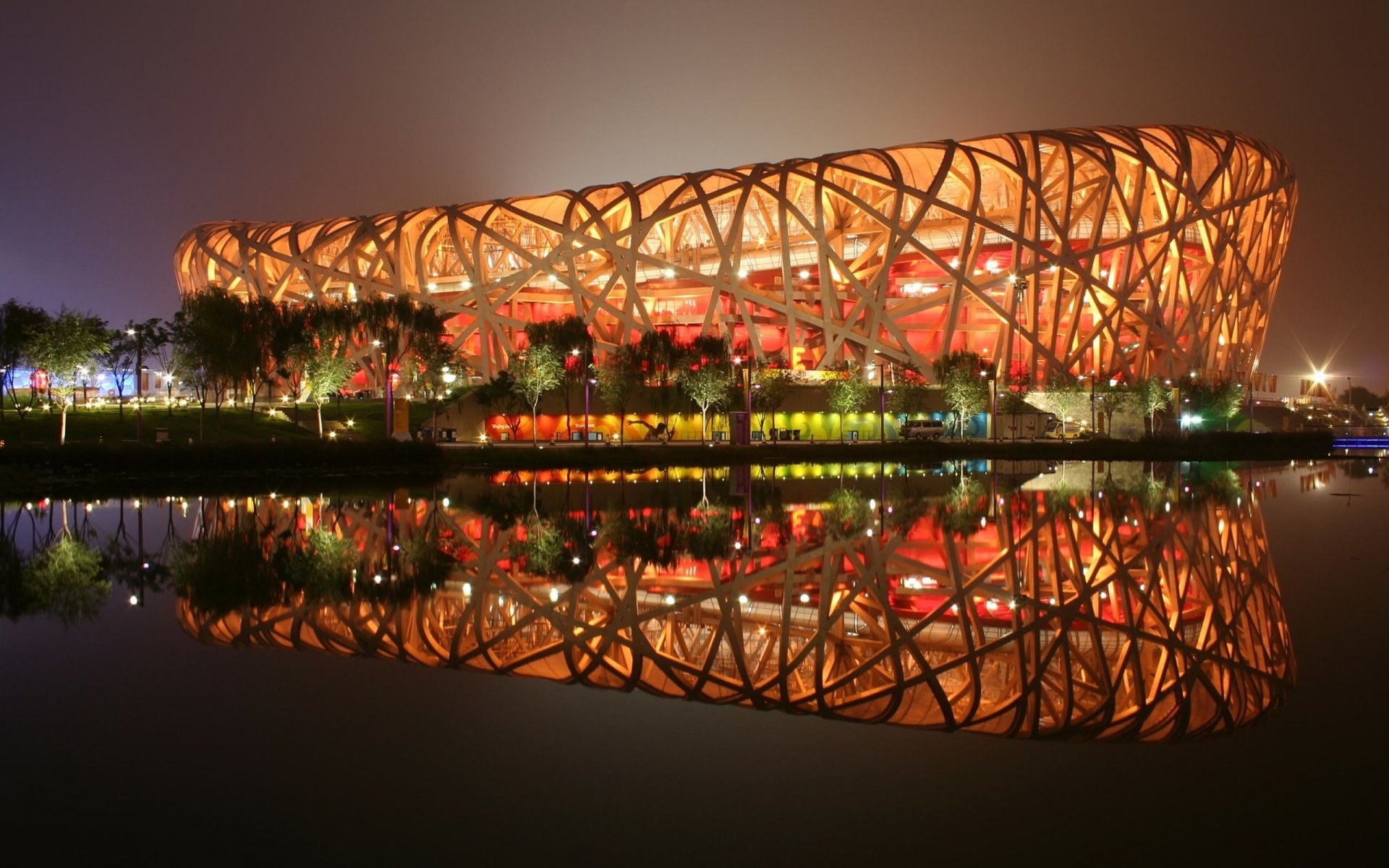 beijing estadio juegos olímpicos nido noche luces reflexión