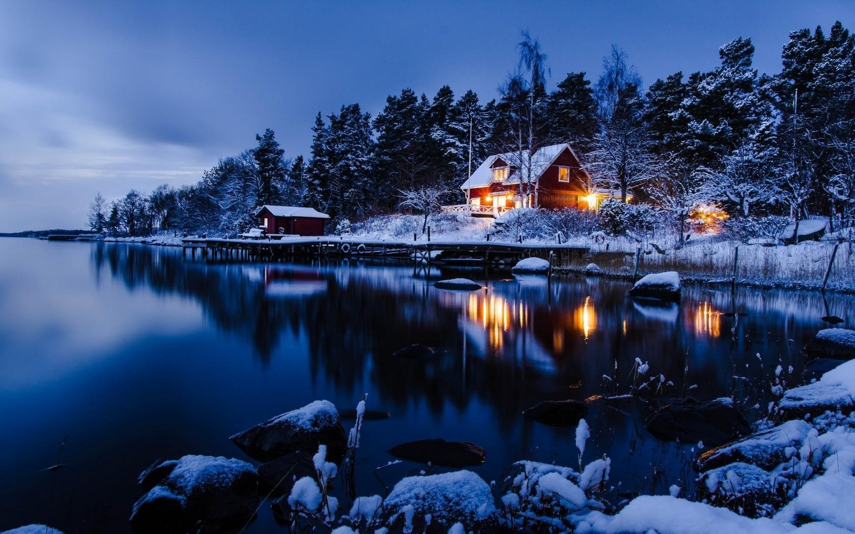 tockholm forest trees water sweden house