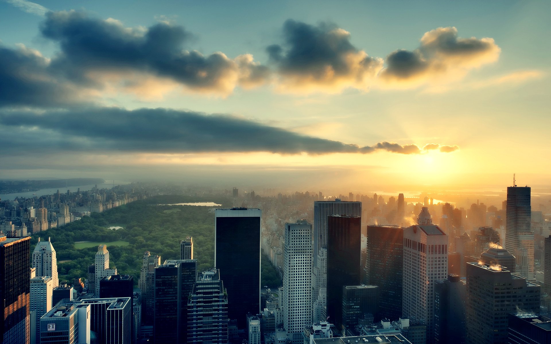 new york nyc high-rise buildings sky clouds sun sunset park