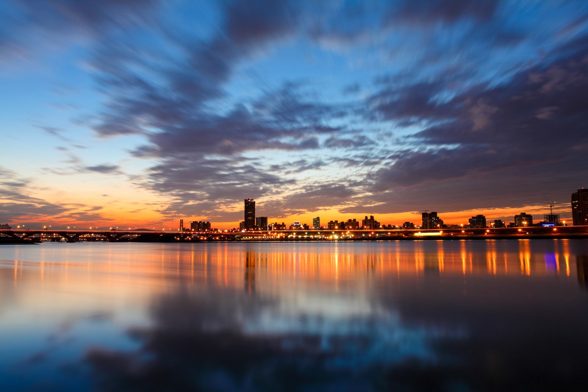 china taiwan taipei city evening sunset bridge lights river reflection sky clouds town night