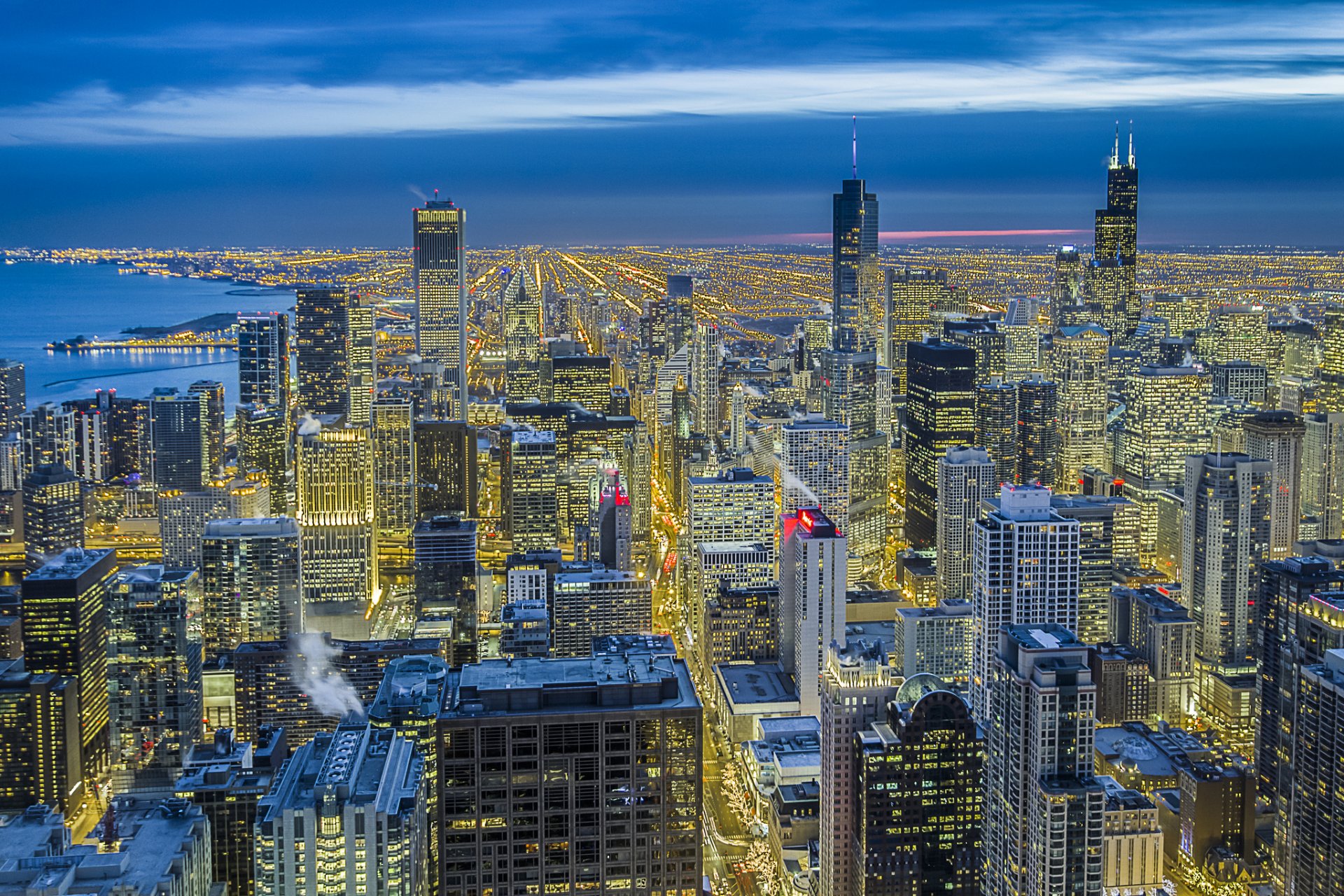 usa illinois chicago magnificent mile miasto metropolia budynki domy drapacze chmur światło oświetlenie widok wysokość panorama noc niebo błękit