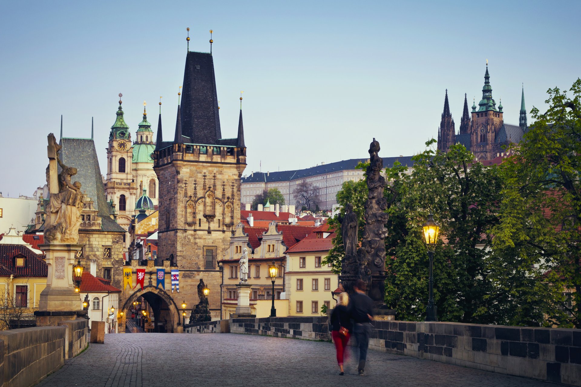 prague charles bridge czech republic praha karlův most česko česká republika town architecture night lamps lighting bridge paving sculpture people the pair tree