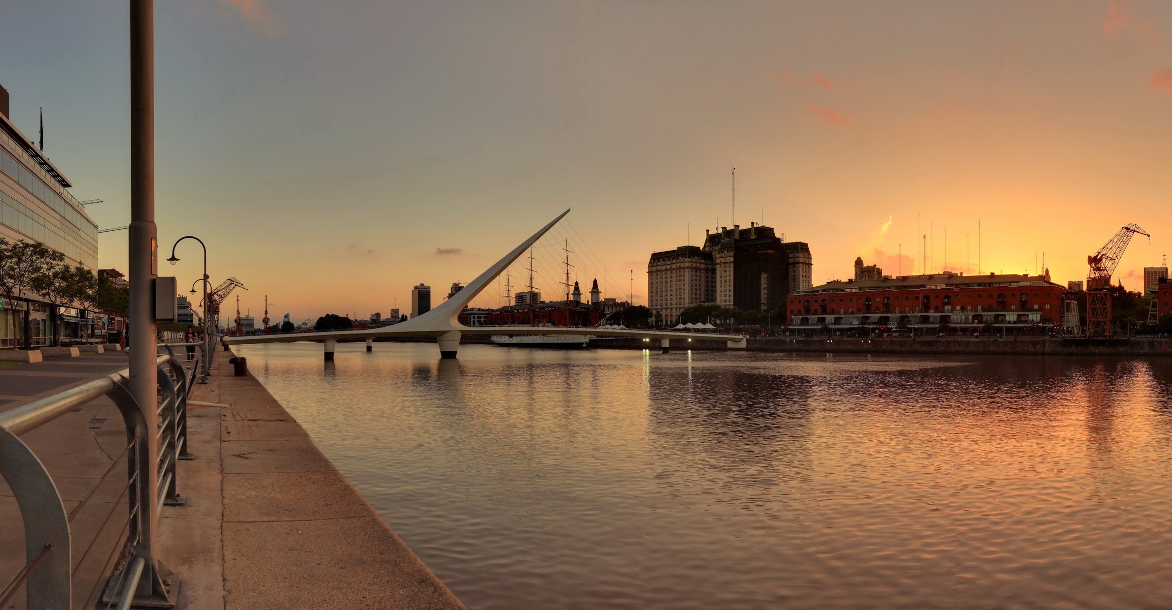 buenos aires argentina embankment sailboats laid up bridge sunset buenos-aire