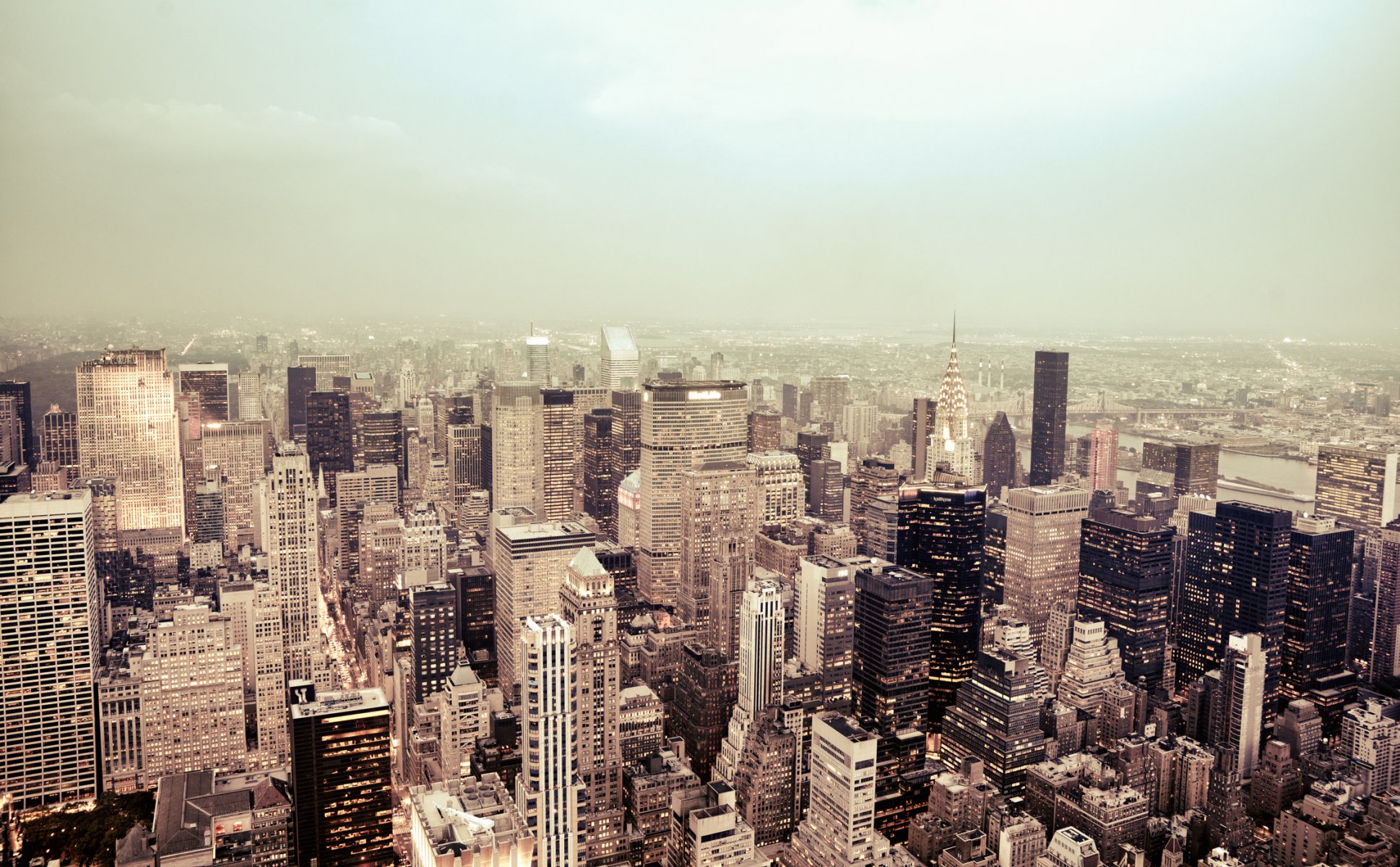 new york usa manhattan empire state building empire state building city fog skyscrapers buildings roofs light